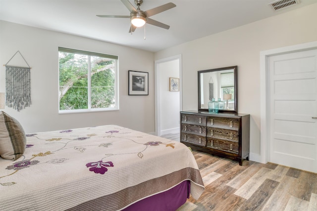 bedroom featuring ceiling fan and light wood-type flooring