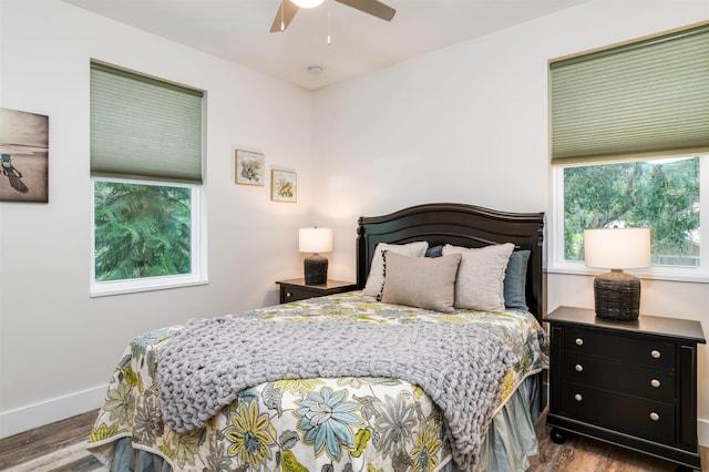 bedroom featuring hardwood / wood-style flooring and ceiling fan