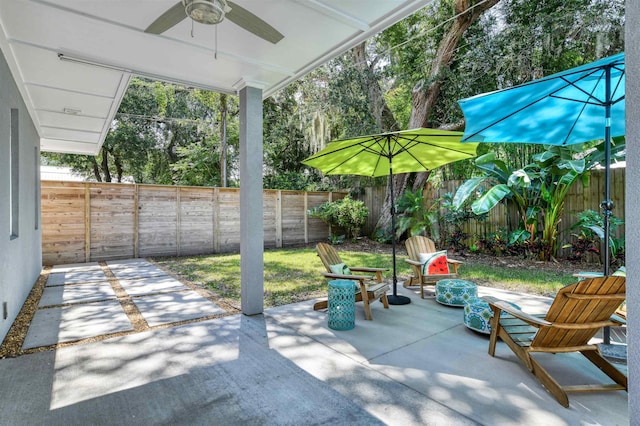 view of patio / terrace featuring ceiling fan