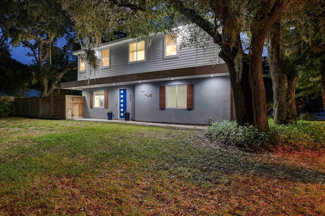 view of front of home with a front yard