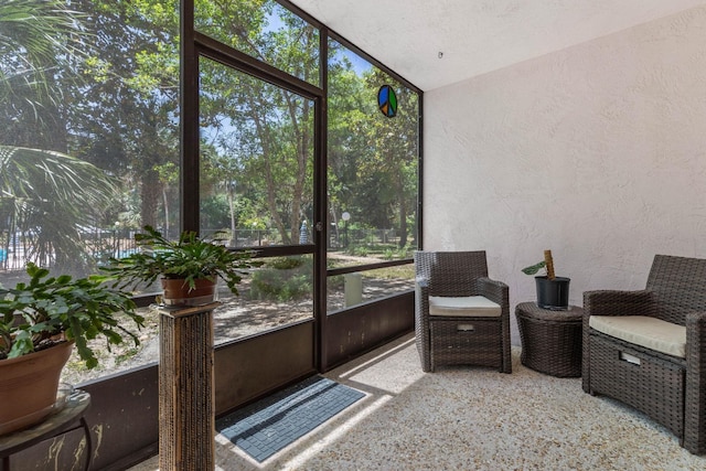 640 N Nova Rd Unit 117, Ormond Beach, FL 32174 - sunroom / solarium featuring vaulted ceiling