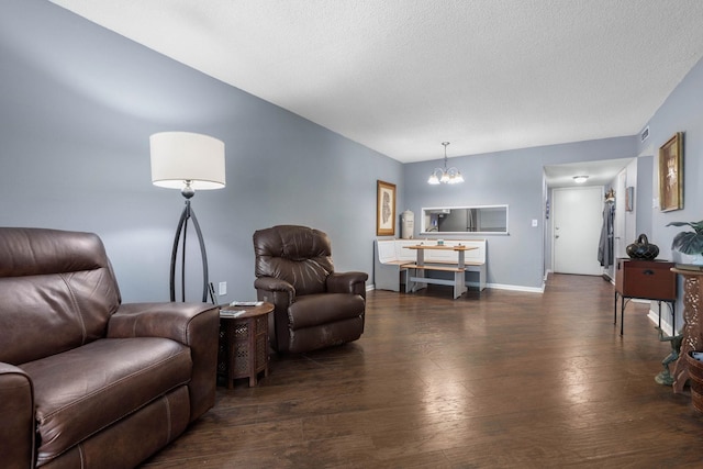 640 N Nova Rd Unit 117, Ormond Beach, FL 32174 - living room featuring a chandelier, wood finished floors, and a textured ceiling