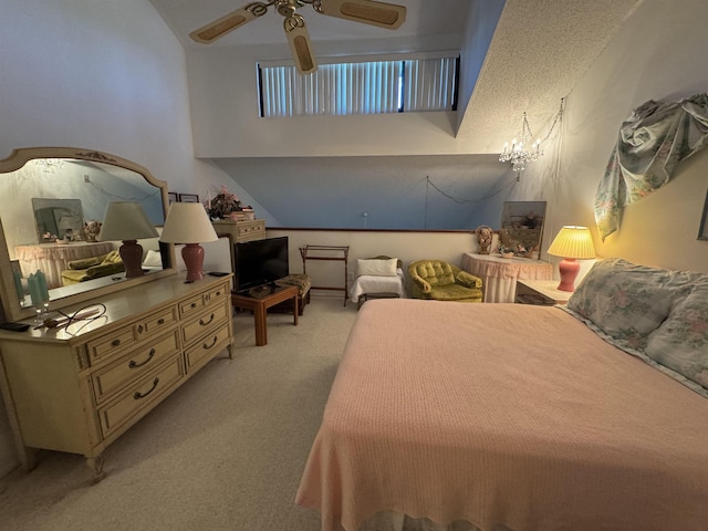 bedroom featuring light carpet and ceiling fan with notable chandelier