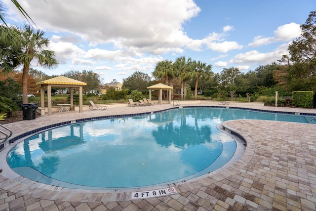 view of pool featuring a gazebo and a patio