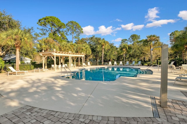 view of pool featuring a pergola and a patio