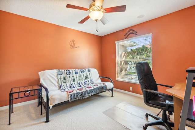 office area with carpet floors and ceiling fan