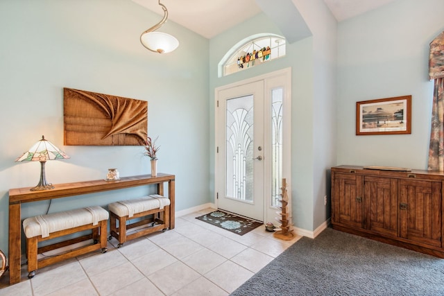 foyer with light tile patterned flooring