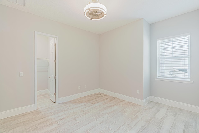 1351 Weaver Glen Rd, Jacksonville, FL 32223 - empty room featuring light wood-style floors and baseboards