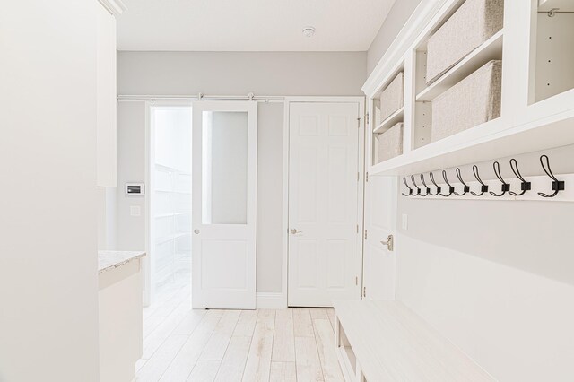 1351 Weaver Glen Rd, Jacksonville, FL 32223 - mudroom featuring light wood-style floors