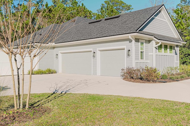 1351 Weaver Glen Rd, Jacksonville, FL 32223 - view of home's exterior featuring a shingled roof, driveway, a garage, and a yard