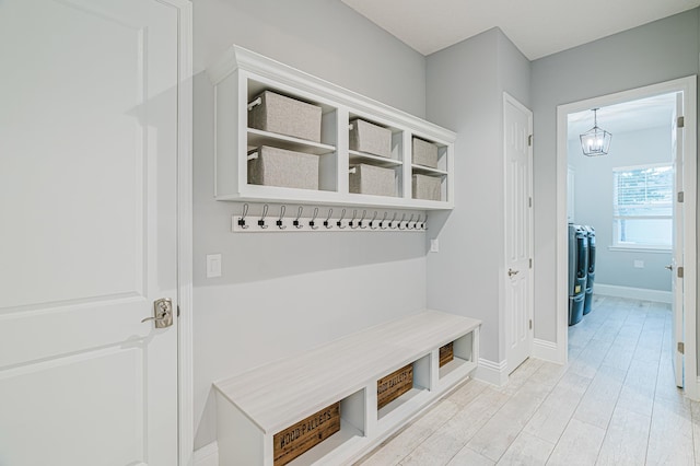 1351 Weaver Glen Rd, Jacksonville, FL 32223 - mudroom featuring a chandelier and light wood finished floors