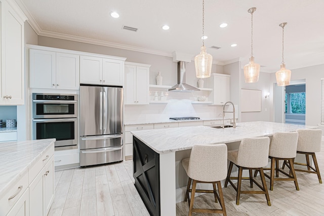 1351 Weaver Glen Rd, Jacksonville, FL 32223 - kitchen with stainless steel appliances, wall chimney range hood, open shelves, crown molding, and white cabinetry