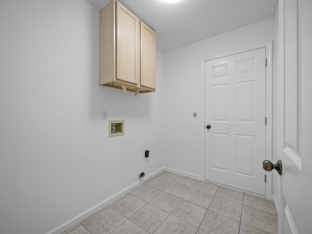 200 Springwood Ln, Saint Johns, FL 32259 - laundry room with washer hookup, light tile patterned flooring, cabinets, and a textured ceiling