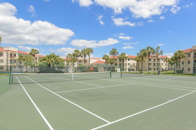 4250 A1A Unit E31, Saint Augustine Beach, FL 32080 - view of tennis court featuring community basketball court