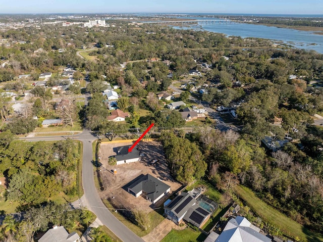 bird's eye view with a water view