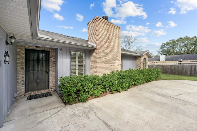 property entrance featuring a patio