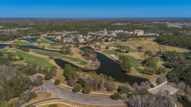 birds eye view of property featuring a water view and golf course view