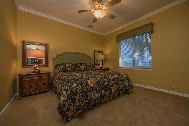 carpeted bedroom featuring ceiling fan, ornamental molding, and baseboards