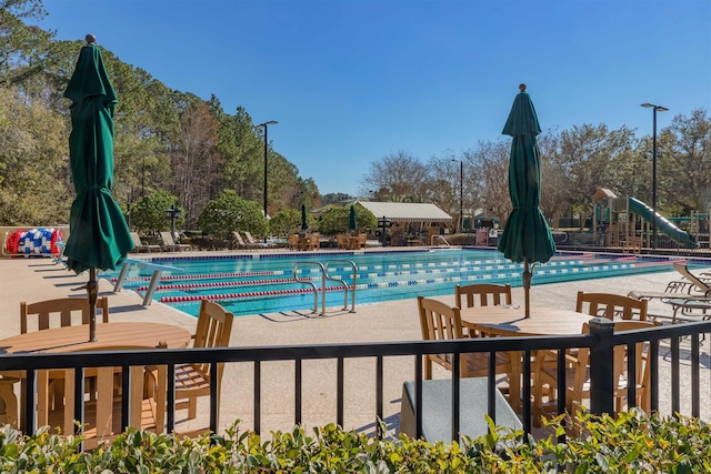 community pool featuring a patio