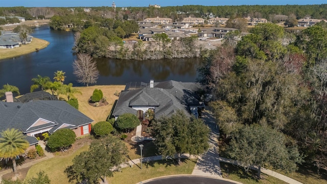 aerial view with a water view and a residential view