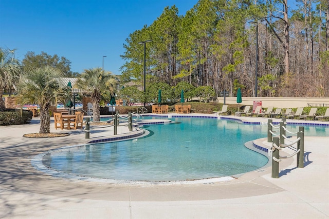 pool with a patio area