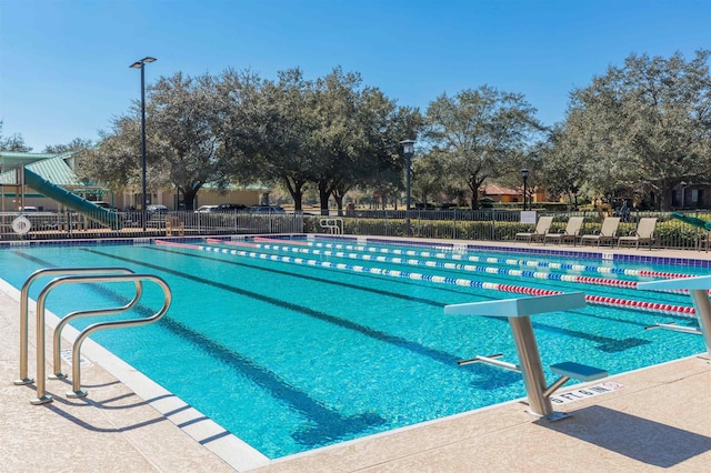 pool featuring fence