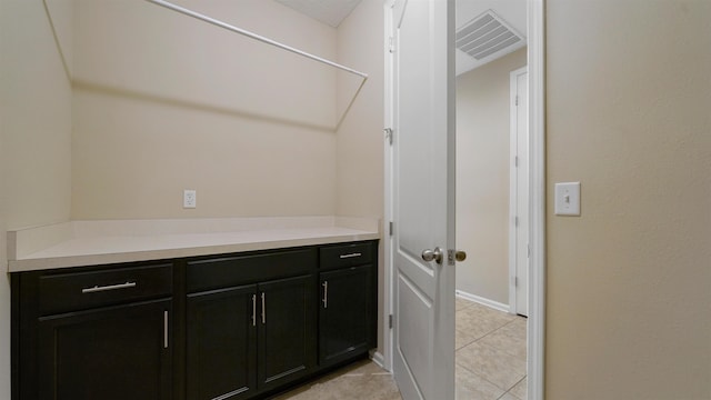 interior space featuring light tile patterned floors