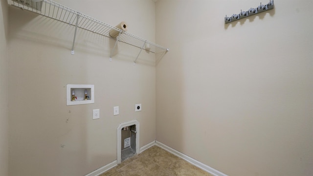 clothes washing area with hookup for an electric dryer and hookup for a washing machine