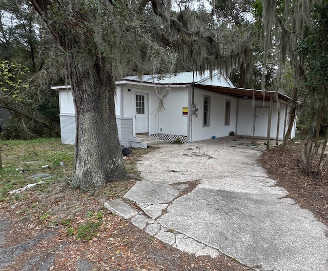 view of front of house with a carport