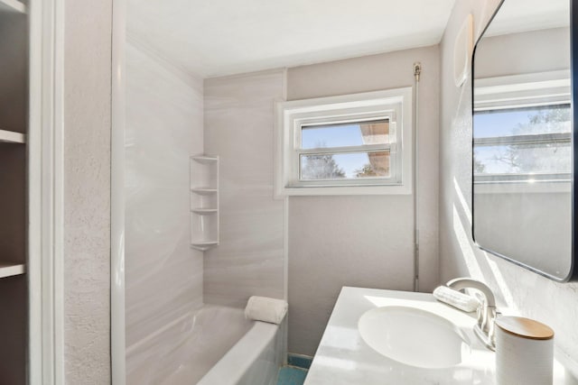 bathroom featuring shower / bathing tub combination and vanity