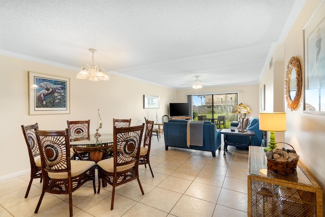 dining space with light tile patterned flooring, ceiling fan with notable chandelier, and ornamental molding