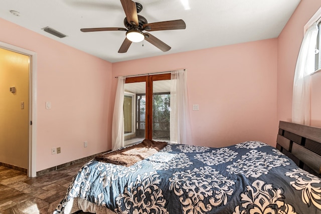 bedroom featuring access to outside and ceiling fan