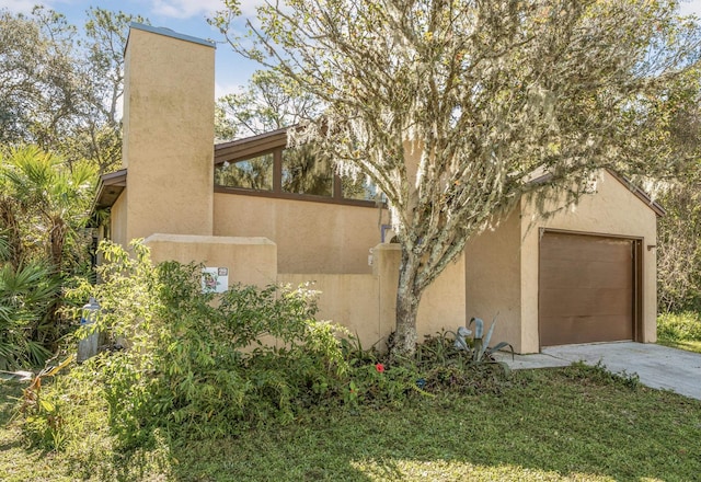 view of home's exterior with a garage