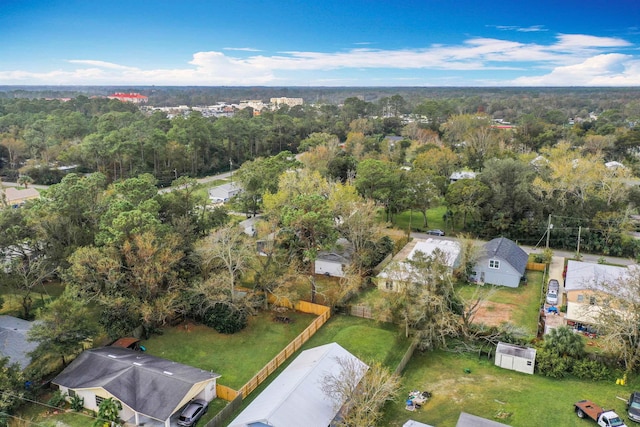 bird's eye view featuring a wooded view