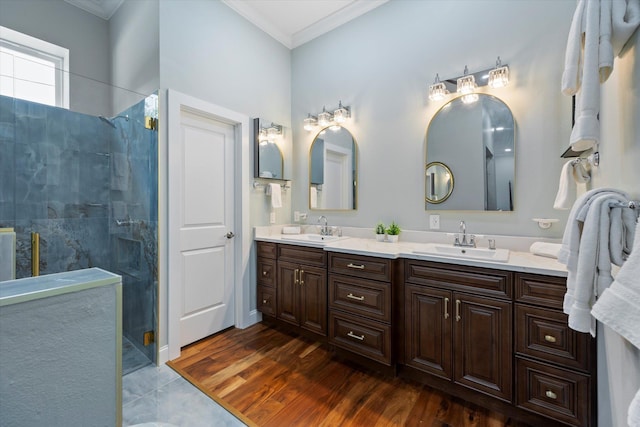3943 NW 219th St, Rdd, Micanopy, FL 32667 - bathroom featuring crown molding, double vanity, and tiled shower