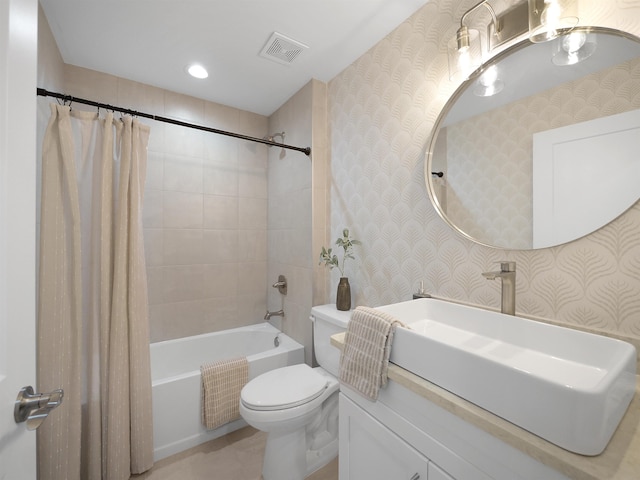 full bathroom with vanity, toilet, and shower / bath combo