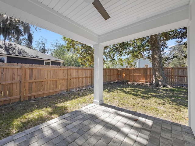 exterior space featuring ceiling fan