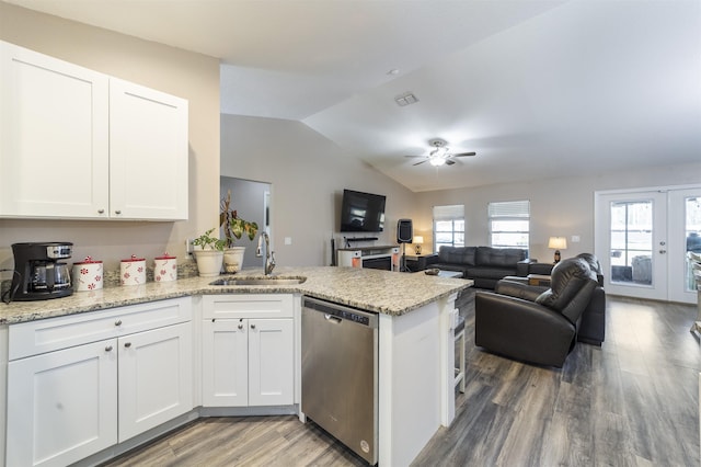 kitchen with dishwasher, white cabinetry, sink, and kitchen peninsula