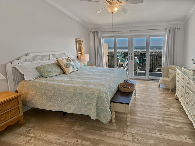 bedroom featuring multiple windows, light wood-type flooring, access to exterior, and ceiling fan