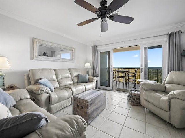 tiled living room featuring crown molding and ceiling fan