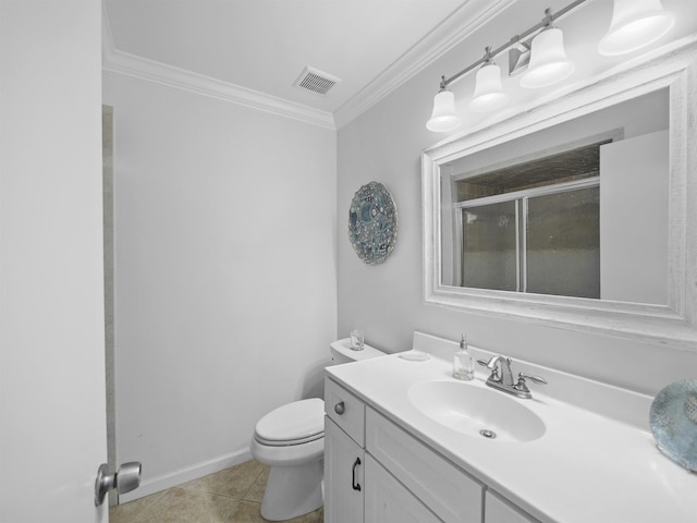 bathroom with crown molding, a shower with door, tile patterned flooring, vanity, and toilet