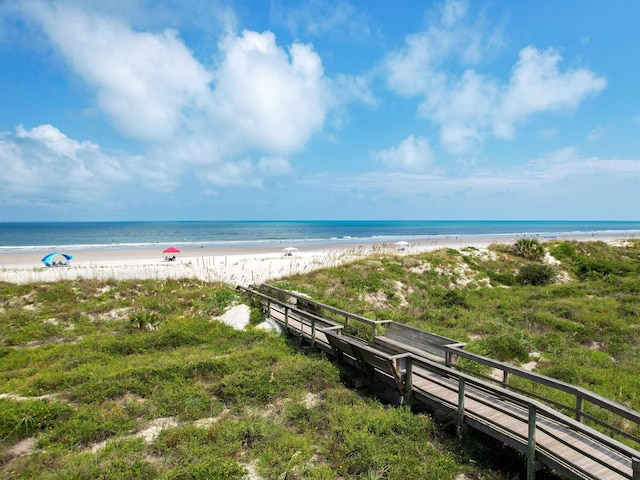 property view of water featuring a beach view