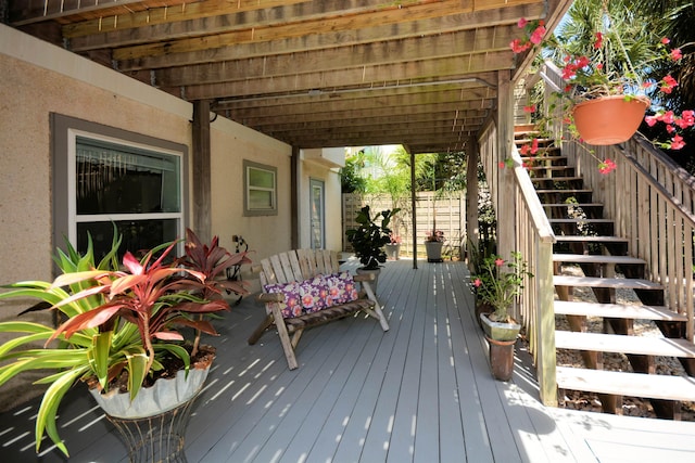 wooden deck featuring a pergola