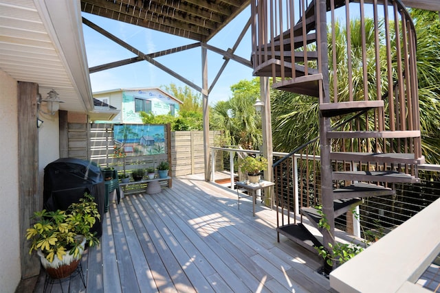 wooden deck featuring grilling area