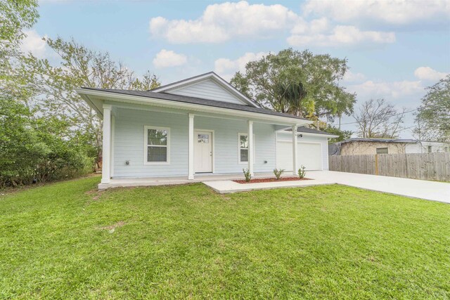 679 Coral Cir, Saint Augustine, FL 32080 - view of front of home featuring concrete driveway, covered porch, and an attached garage