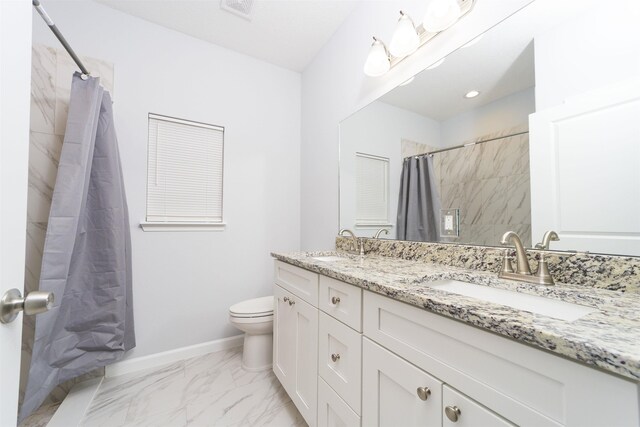 679 Coral Cir, Saint Augustine, FL 32080 - full bath with double vanity, a shower with curtain, and marble look tile flooring