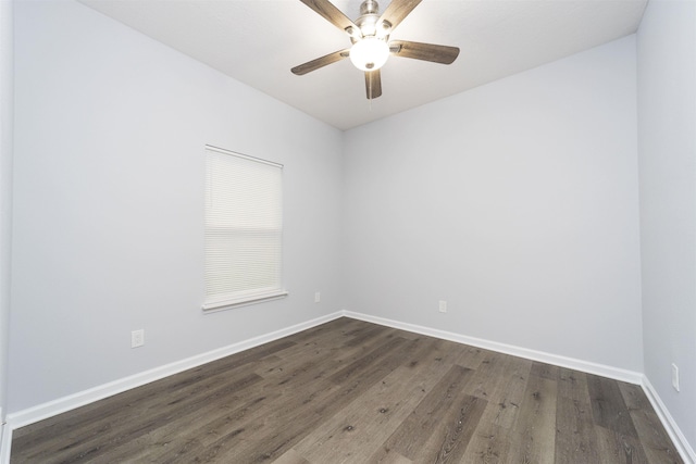 unfurnished room featuring dark hardwood / wood-style floors and ceiling fan