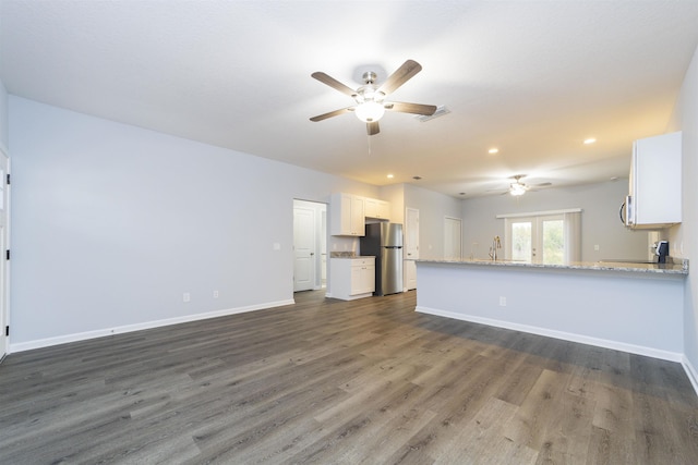 679 Coral Cir, Saint Augustine, FL 32080 - unfurnished living room with a ceiling fan, dark wood finished floors, and recessed lighting