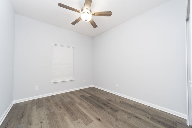 spare room featuring dark hardwood / wood-style floors