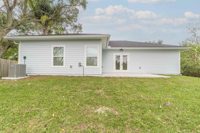 679 Coral Cir, Saint Augustine, FL 32080 - rear view of house with french doors and a patio